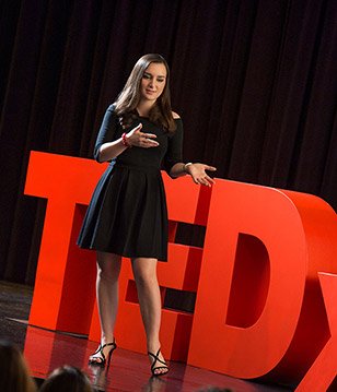 student-delivering-a-TEDx-speech