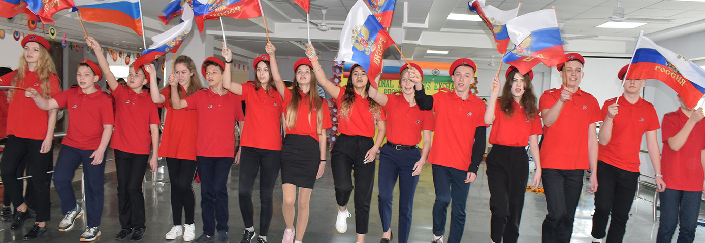 Students waving flags at the best CBSE school in Gurgaon. A spirited event at this top school in Gurugram.